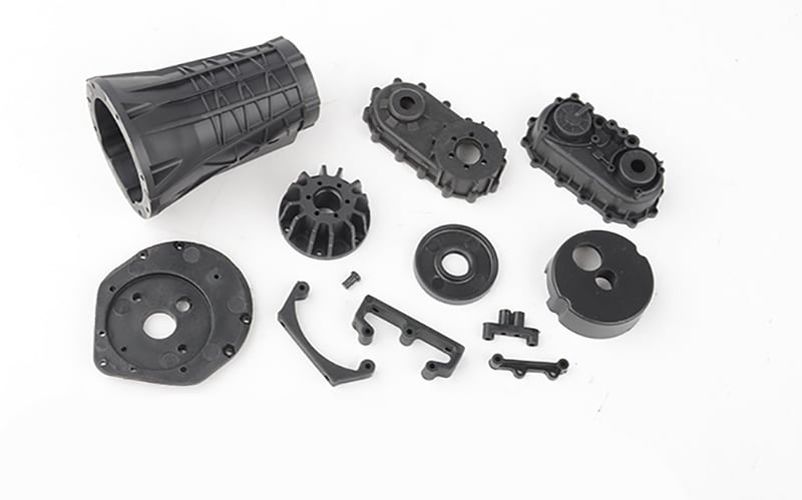 Transmission and Transfer Case Plastic Housing Assembly